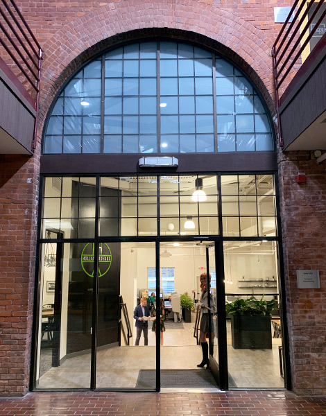 Glass door with half-circle window at Holland Adhaus in Cincinnati