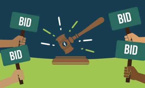 Illustration of gavel banging and hands holding Bid signs, representing Facebook bid strategy